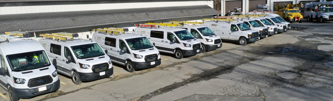 Photo of the fleet of trucks used by Piper Electric, a division of Elm Electrical.